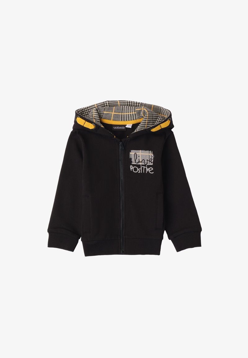 Felpa nera con zip e dettagli gialli, foderata con motivo houndstooth nella cappuccio e occhiali "Positive" ricamati sul davanti. Materiale in cotone morbido.