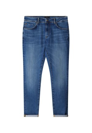 Blue denim jeans with a slim fit, five pockets, and rolled hems. The fabric has a slightly washed texture and contrasts stitching.