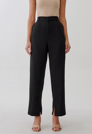 TUSSAH RACHEL  - Trousers - black