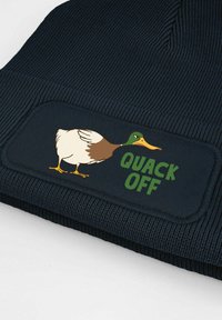 Dark navy beanie with a textured knit pattern. Features an embroidered patch of a duck and the text "QUACK OFF" in green.
