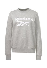 Grå sweatshirt i bomullsblandning, med ribbad rund halsringning och muddar, samt en stor vit Reebok-logotyp på framsidan.