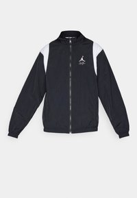 Černá větrovka s bílými akcenty, se zapínáním na zip a stojáčkem. Na hrudi je umístěno logo a manžety jsou elastické.