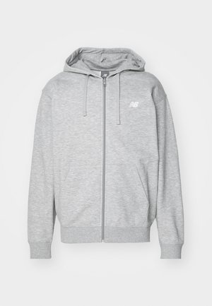 Gray zip-up hoodie made of soft fabric with a front zipper, two side pockets, a hood, and a small logo on the left chest area.