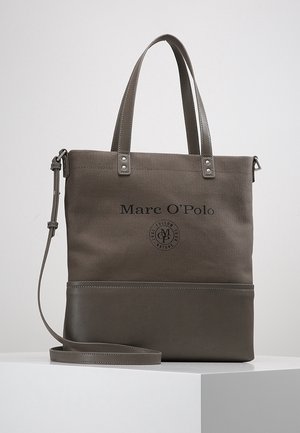 Brown Marc O'Polo tote bag with leather bottom, two handles, and an adjustable shoulder strap, displayed on a white surface.
