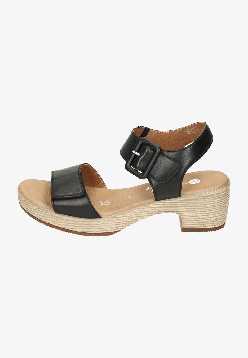 Black leather sandal with a wide strap, adjustable buckle, and a textured, light-colored wedge heel. Smooth footbed with rounded toe.