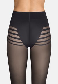 Collant neri con pannelli in rete trasparente e strisce orizzontali sulle cosce, vita liscia e gambe opache per un effetto a più livelli.