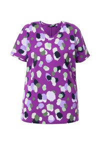 Fialové tričko s krátkým rukávem se vzorem mnohobarevných teček v zelené, černé a bílé. Design s výstřihem do V a volný střih.