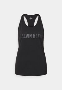 Musta hihaton toppi pyöreällä kaula-aukolla, jossa on kiiltävä "CALVIN KLEIN" -logo edessä. Valmistettu sileästä, kevyestä materiaalista.