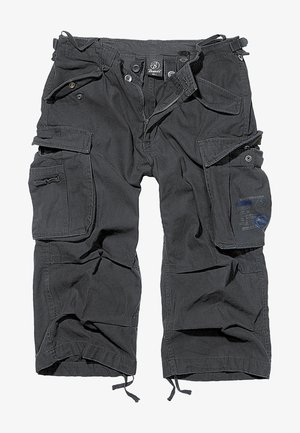 Mustat cargo-shortsit, jotka on valmistettu kestävästä kankaasta. Niissä on useita taskuja, vetskari ja säädettävät narut helmassa mukautuvan istuvuuden saavuttamiseksi.