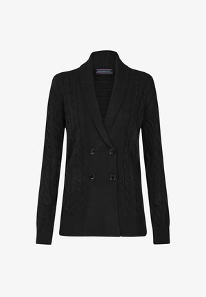 Black knitted cardigan with cable pattern, double-breasted design, and large buttons. Features a shawl collar and long sleeves.