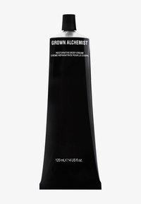 Czarny aluminiowy tubka regenerującego kremu do ciała, z białym napisem. Pojemność: 120 ml lub 4 untce amerykańskie. Można ściskać, z plastikową zakrętką.