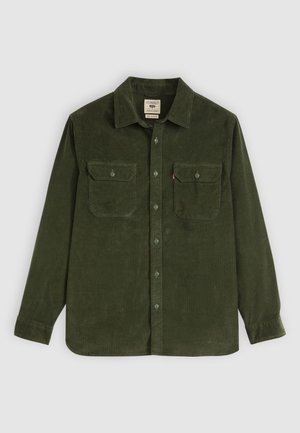Donkergroene corduroy shirt met lange mouwen, knoopsluiting aan de voorkant, twee borstzakken en een ontspannen pasvorm. Heeft een gestructureerde stof en een soepele kraag.