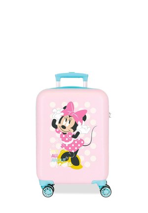 Maleta rígida rosa con asa y ruedas azules, con Minnie Mouse vestida con un vestido rosa de lunares y un lazo, sobre un fondo de lunares blancos.