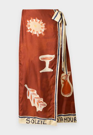 Rust-colored wrap skirt with sun, leaf, goblet, and jug illustrations, tied with cream and blue striped sash, text "Soleil d'Amour" at hem.