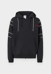 Μαύρο φούτερ με φερμουάρ μέχρι κάτω, με λευκές ρίγες στα μανίκια και το στήθος, μπροστινές τσέπες, κουκούλα με κορδόνι και μικρό κόκκινο λογότυπο Adidas στο αριστερό στήθος.