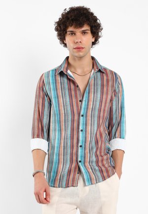 Multicolored striped shirt with a button-down front, featuring blue, orange, and white vertical stripes; long sleeves with rolled cuffs.