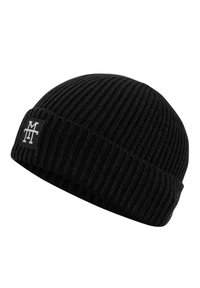 Black knit beanie with ribbed texture, featuring a folded cuff and a small rectangular logo patch in white.