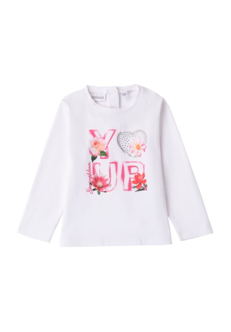 Camicetta bianca a maniche lunghe con "YOU" e "UP" in rosa, decorata con motivi floreali e un cuore argentato. Materiale in cotone morbido, design con scollo rotondo.