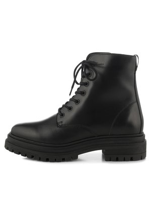 Black leather ankle boot with round toe, lace-up front, and thick rubber sole featuring deep tread for slip resistance.