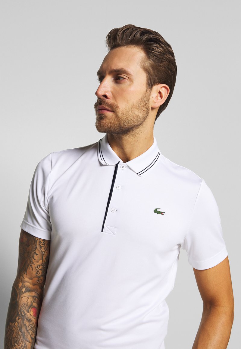 Herren Shirts | Lacoste Sport BASIC GOLF Sport T-shirt white/navy blue/weiß - TB96968 Herren Shirts | Lacoste Sport BASIC GOLF Sport T-shirt white/navy blue/weiß - TB96968