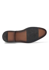 Zwarte zool met gestructureerd bruin rubber en gegrofde secties. Bevat blauwe stiksels langs de rand en merkdetails. Ronde vorm.