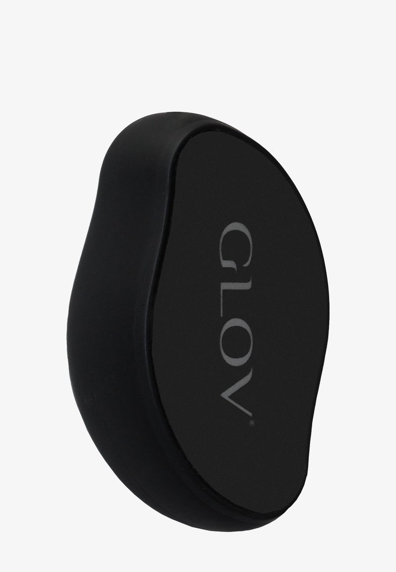 Czarna silikonowa szczoteczka do oczyszczania o miękkiej, gładkiej fakturze. Posiada ergonomiczną formę i wypukłe logo "GLOV" na powierzchni.