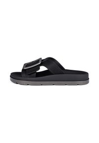 Black slide sandal featuring a wide strap with a square metallic buckle, textured fabric, and a durable rubber sole with subtle grooves.