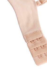 Ljust rosa elastisk tyg med en slät yta. Har en krok-och-öga-stängning med tre justerbara remmar och mjuka sömmar.