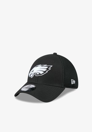 Casquette de baseball noire avec un logo blanc des Philadelphia Eagles à l'avant et des panneaux en mesh sur les côtés, étiquetée taille moyenne-grande.