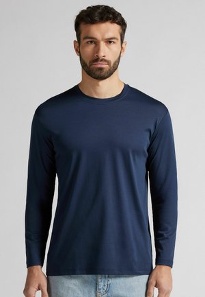 Marineblaues Langarmshirt aus glattem Stoff mit Rundhalsausschnitt und figurbetontem Design, verfügt über lange Ärmel und einen geraden Saum.