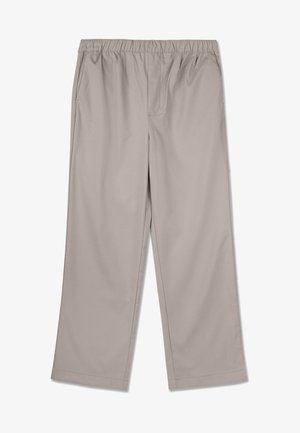 Calças largas em bege com cintura elástica. Feitas de um tecido suave, apresentam bolsos laterais e um corte reto, sem padrões visíveis.