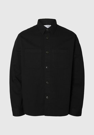 Black long-sleeve button-up shirt with two chest pockets and a classic collar, displayed against a plain light background.