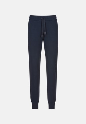 Pantalon de jogging bleu marine en tissu doux, doté d'une taille élastique avec cordon de serrage et de poignets côtelés au niveau des chevilles.