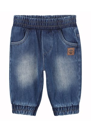 Pantalons joggers en denim bleu moyen avec une taille élastique, deux poches avant et une étiquette logo marron sur le côté gauche.