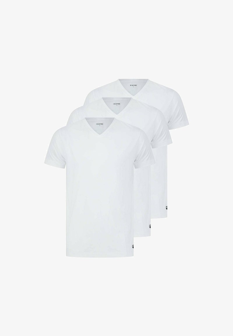 Drei schlichte weiße T-Shirts mit kurzem Ärmel und V-Ausschnitt übereinander gestapelt, mit einem kleinen "G-STAR"-Text im Kragen.