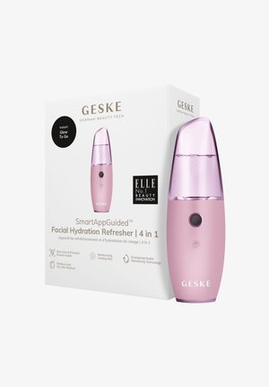 Pink facial hydration refresher device with a sleek, rounded design. The nozzle has a translucent top and a circular button on the body.
