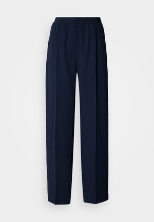 Pantalon droit bleu marine avec taille élastique et pli avant, présenté sur un fond blanc uni.