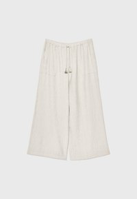 Pantalon large en lin beige avec taille élastique et cordon à pompons, poches avant et texture verticale subtile.
