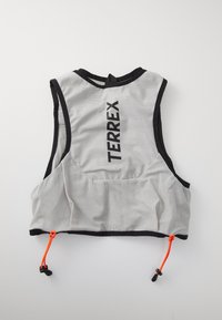 Gray mesh performance vest with black accents, adjustable orange drawstring, and "TERREX" logo prominently displayed on the back.
