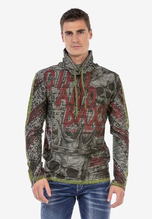 Grauer Kapuzenpullover mit roten und schwarzen grafischen Drucken, die Schädel- und Krondesigns zeigen. Texturiertes, leichtes Material mit Zugbändern.