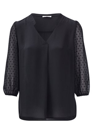 Blusa nera con scollatura a V, caratterizzata da maniche puff trasparenti con motivo a pois e un tessuto liscio e leggero.