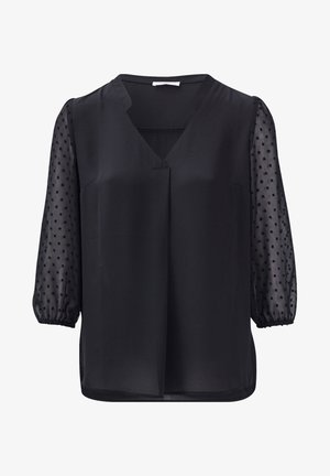 Blusa nera con scollatura a V, caratterizzata da maniche puff trasparenti con motivo a pois e un tessuto liscio e leggero.