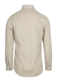Langsleeve shirt in crème met een klein geometrisch patroon. Beschikt over een button-down kraag, enkele manchetten en een soepele stoftextuur.
