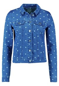Blue denim jacket with white polka dots, button-up front, two chest pockets, and long sleeves.