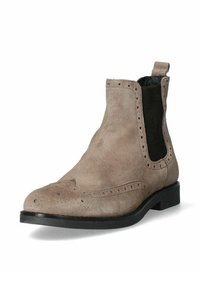 Stivale Chelsea in suede beige chiaro con dettagli perforati, pannelli laterali elasticizzati neri e tacco basso nero. Design classico con punta rotonda.