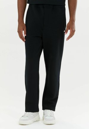 Ellesse, CALDONA TRACK PANT - Pantalon de survêtement - black