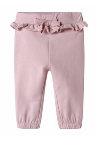 Pantalons en coton rose avec taille élastique, accent froncé et détail nœud. Jambes fuselées avec poignets élastiques aux chevilles. Texture douce.