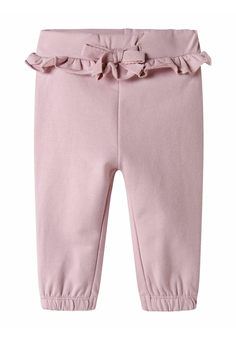 Pantalons en coton rose avec taille élastique, accent froncé et détail nœud. Jambes fuselées avec poignets élastiques aux chevilles. Texture douce.