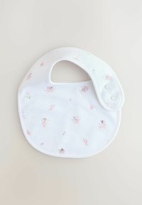 Fehér baba előke puha pamutból, finom rózsaszín tündér- és virágmintával, két patentos záródással.