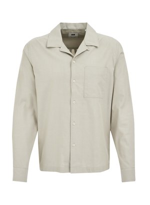 Hele beež pikkade varrukatega shirt, otsekrae, eesmine tasku ja nööpidega kinnitamine. Valmistatud pehmest, tekstuuriga kangast.